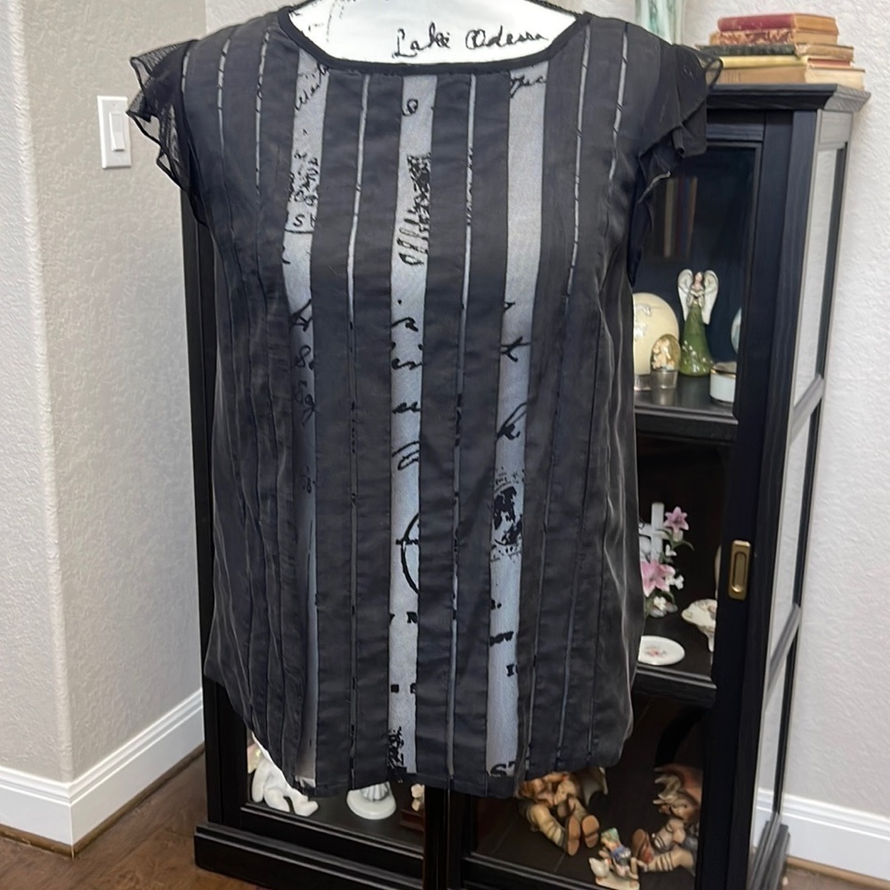 205- Bebe Black Sleeveless top, size small. Gently used. 100% Silk!